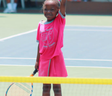 YES-Neriah-Watson-Gospel-Refuge-Basic-Schools-Play-Stay-Tennis-enthusiast-on-court-and-full-of-confidence